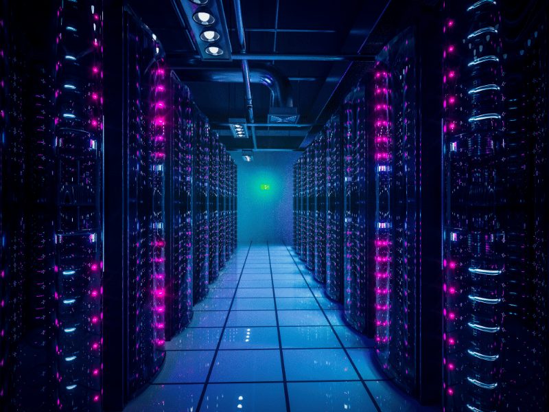 Modern UK data centre server racks with LED lighting, representing critical infrastructure requiring reliable temporary power